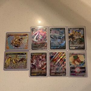 8 Full Art Holo Never Used Pokemon Cards in Sleeves and Top Loaders